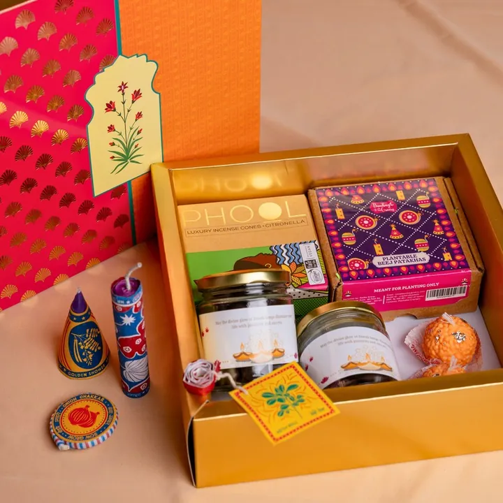 Harmony Treat Box, a Diwali gift hamper with Mixed dry fruits jar, Almond-coated nutties jar and Phool incense cones